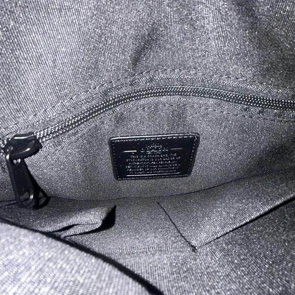 Coach BlackBag with Sleek Monogram Design